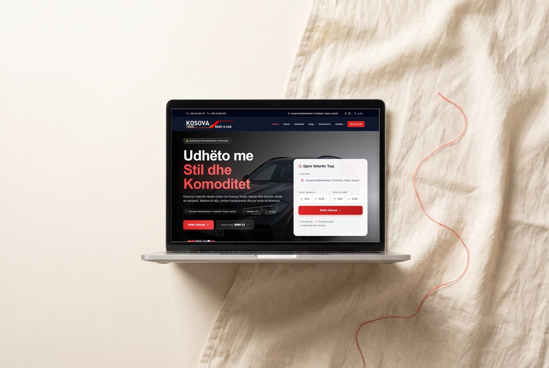 Kosova Trade Rent a Car website on a laptop